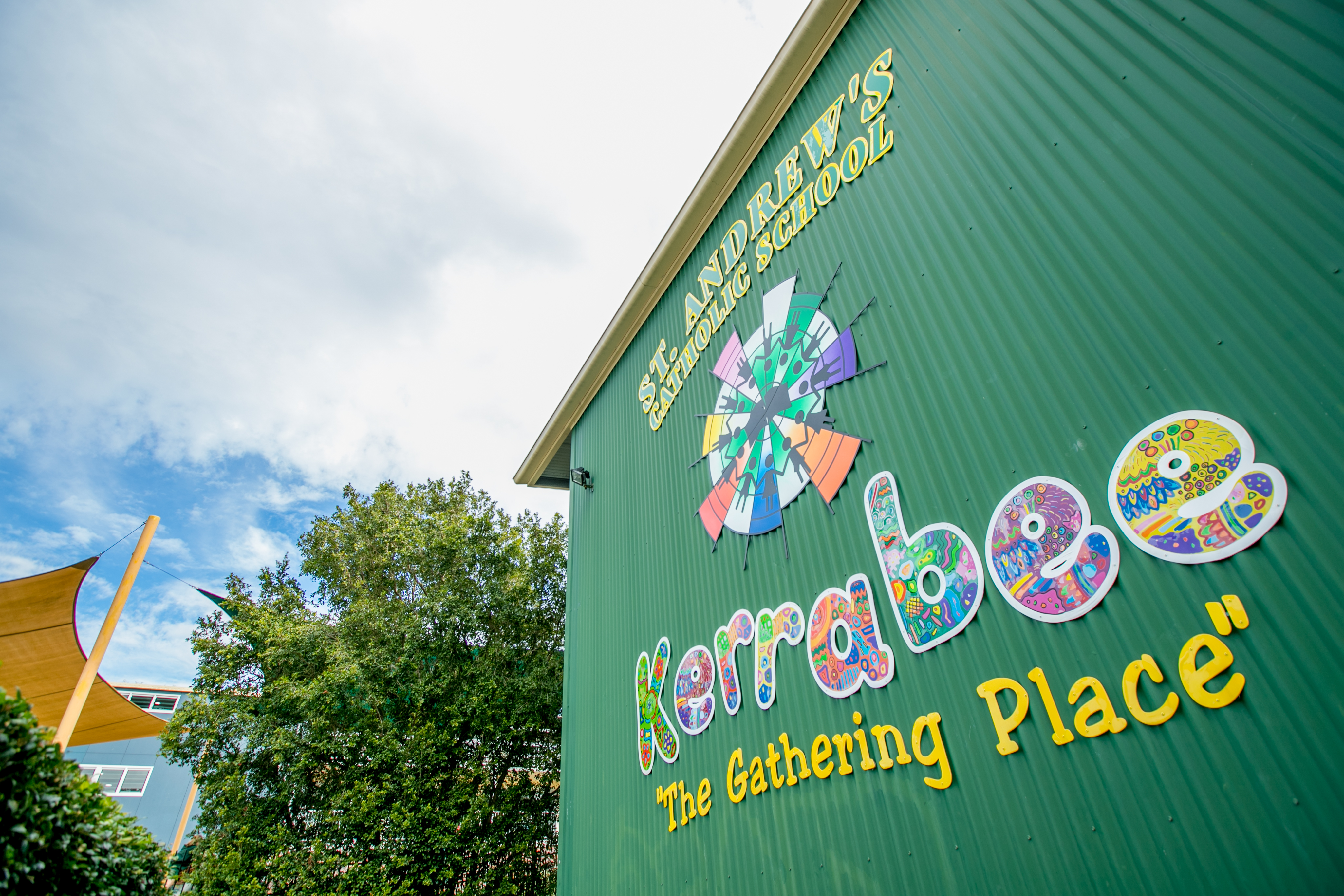 view of school building depicting the words "Kerrabee" - the Gathering Place